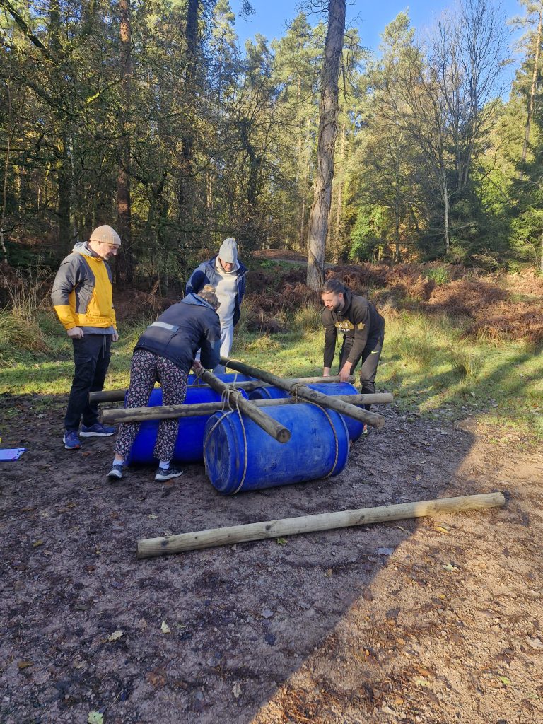 20241126_103928 A group of 3 building a raft
